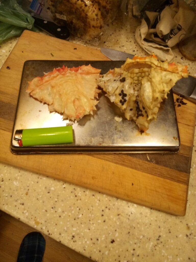 Crab tail meat on a cutting board